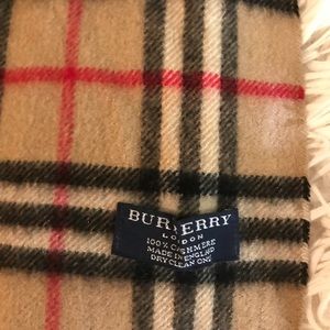 Never worn authentic Burberry scarf !